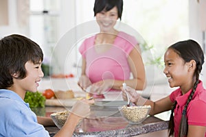 Children Enjoying Breakfast