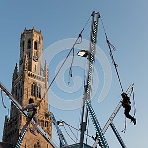 Children enjoying playground on Grote Markt in the city of Bruges