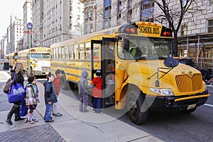 Children entering school bus.