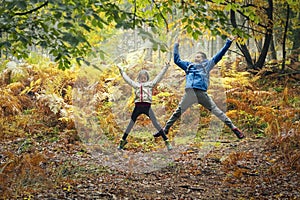 Children exploring the nature. Happy kids playing in the forest