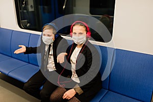 Children with face mask going back to school after covid-19 quarantine and lockdown