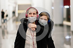 Children with face mask going back to school after covid-19 quarantine and lockdown