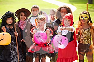 Children In Fancy Costume Dress Going Trick Or Treating