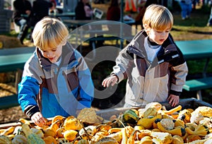 Children at Farmers Market Selecting Vegetables.