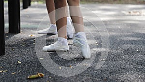 Children feet in Pointe shoes. Practice ballet. Dancer. Slow motion. Close-up