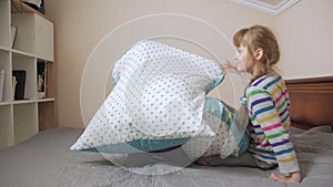 Children Fight With Pillows