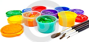 Children finger paint and paintbrushes isolated
