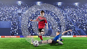 2 children football players in scrimmage for the ball on a stadium photo