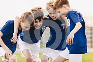 Children Football Team Players. Happy Sports Boys in a School Team. Kids Huddling in a Team on Tournament Competition