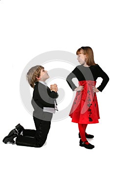 Children in formal clothing proposing