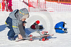 Children fun activity ski resort winter outfit