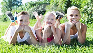 Children funning at grass