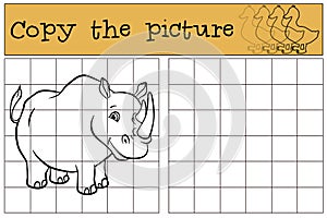 Children games: Copy the picture. Cute rhinoceros. photo