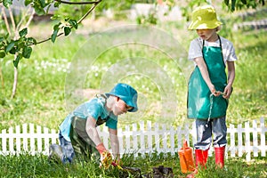 Children gardening and watering