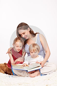 Children get a story read aloud