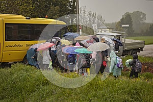 Children getting on the school bus