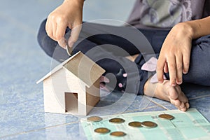 Children girl learning to saving money