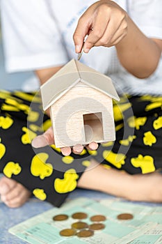 Children girl learning to saving money