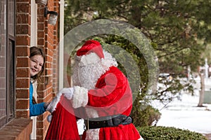 A of children giving gift box a santa claus