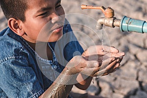 Children are glad to have water to drink.