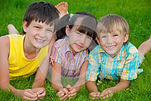 Children on green grass