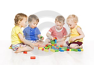 Children Group Playing Toy Blocks. Little Kids Early Development