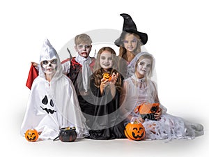 Children in Halloween costume on white