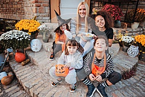 Children in Halloween costumes, trick or treating