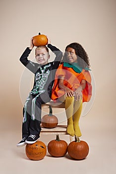 Children with halloween pumpkins