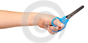 Children hand with blue little scissors, kids educational work