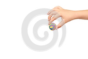 Children hand with color rubber ball, kids educational toy