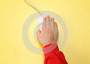 Children hand with mouse