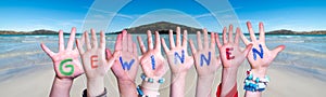 Children Hands Building Word Gewinnen Means Win, Ocean Background photo