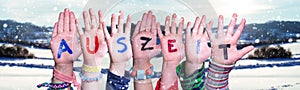Children Hands Building Word Auszeit Means Downtime, Snowy Winter Background