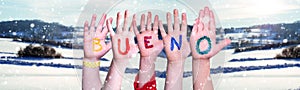 Children Hands Building Word Bueno Means Good, Winter Background photo