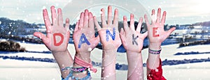Children Hands Building Word Danke Means Thank You, Snowy Winter Background
