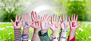 Children Hands Building Word Familie Means Family, Grass Meadow