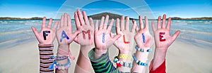 Children Hands Building Word Familie Means Family, Ocean Background photo