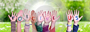 Children Hands Building Word Forgive Us, Grass Meadow