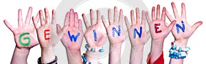Children Hands Building Word Gewinnen Means Win, Isolated Background photo