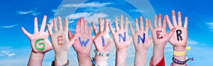 Children Hands Building Word Gewinner Means Winner, Blue Sky