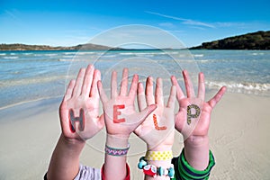Children Hands Building Word Help, Ocean Background