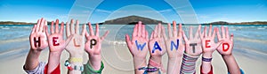 Children Hands Building Word Help Wanted, Ocean Background