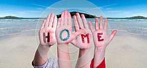 Children Hands Building Word Home, Ocean Background