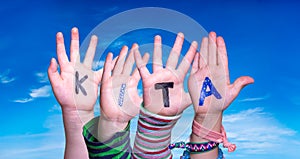 Children Hands Building Word KITA Means Kindergarden, Blue Sky