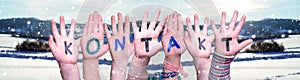 Children Hands Building Word Kontakt Means Contact, Winter Background