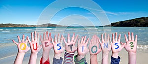 Children Hands Building Word Questions, Sea And Ocean Background