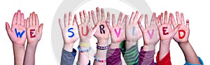 Children Hands Building Word We Survived, Isolated Background