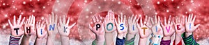 Children Hands Building Word Think Positive, Red Christmas Background