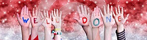 Children Hands Building Word Well Done, Red Christmas Background